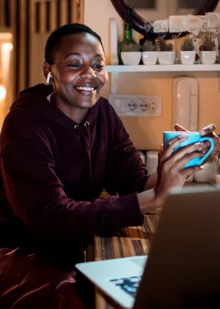 Woman working from cafe