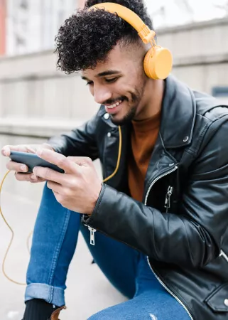 Young man gaming on the go